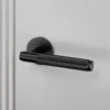 DOOR HANDLE / CROSS / SPRUNG / PASSAGE / BLACK - This Old House
