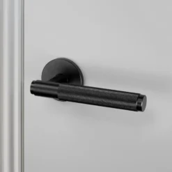 DOOR HANDLE / CROSS / SPRUNG / PASSAGE / BLACK - This Old House